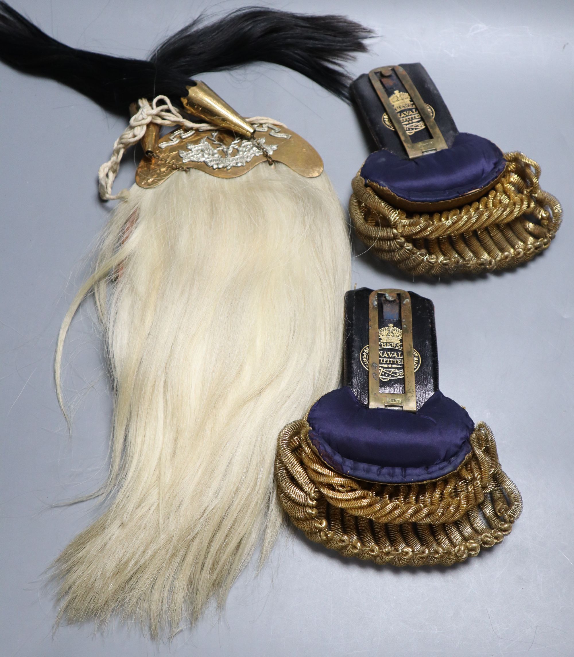 A pair of naval epaulettes and a Military sporran